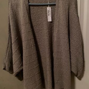 Taupe colored cardigan; over-sized, wider sleeves. Super soft. NWT
